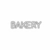 Embossed "BAKERY" sign on a white background.