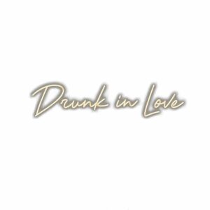 Drunk in Love" cursive neon sign text.