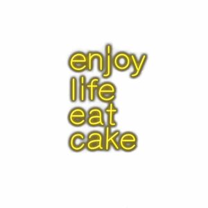 Inspirational quote "Enjoy life eat cake" with yellow glow.