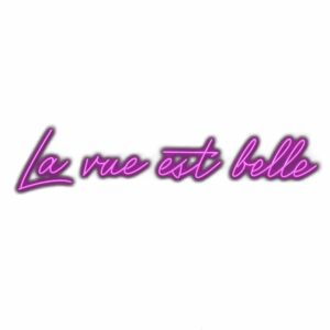 Neon purple 'La vie est belle' script sign