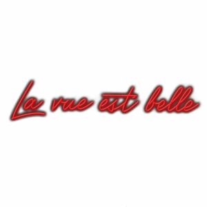 Red neon sign reading 'La vie est belle'