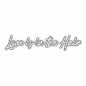 Cursive text "Love is in the Hair" shadowed on white background.