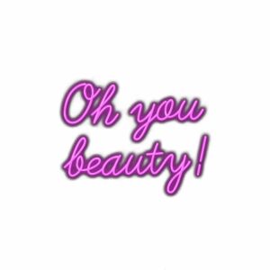 Neon-style sign reading "Oh you beauty!" in purple.
