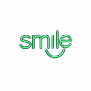 Neon sign with the word "smile" and smiley face.