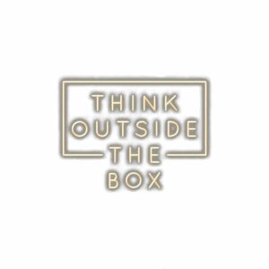Think outside the box" neon sign text.