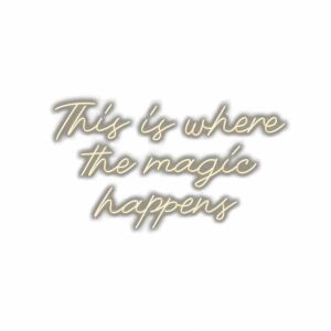 Inspirational quote text "This is where the magic happens".