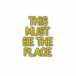 Neon sign text "This Must Be The Place