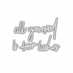 Beauty quote "All you need is love lashes" text.