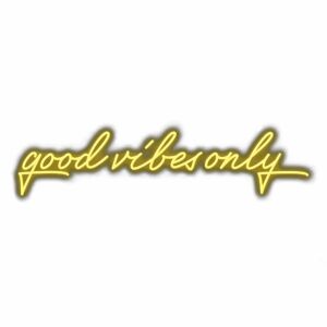 Good vibes only" yellow cursive neon sign.