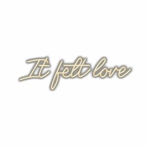 Inspirational cursive text 'It felt love' on white background.